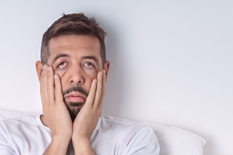 Exhausted Sleepy Man With Chronic Fatigue Or Hangover