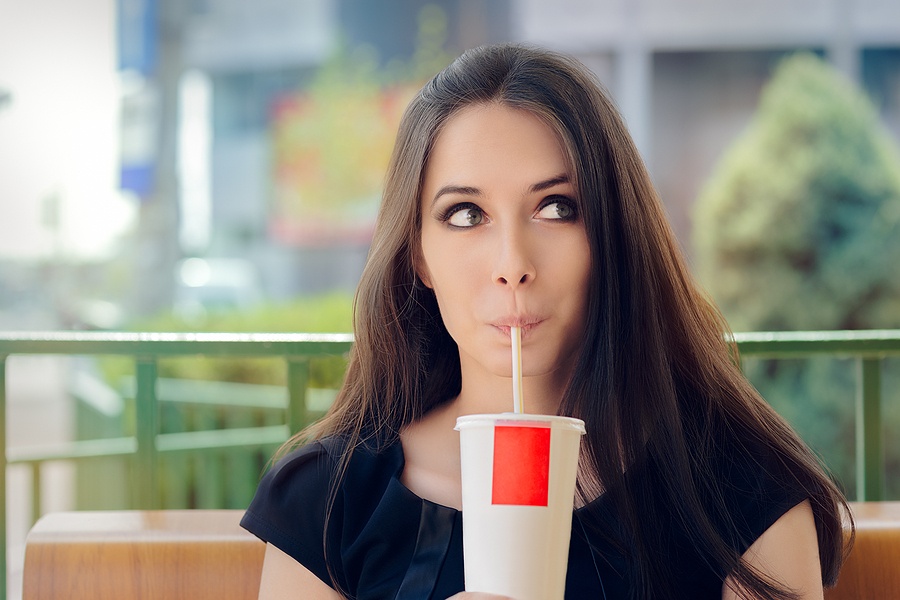 Woman Having a Summer Refreshing Drink Outside