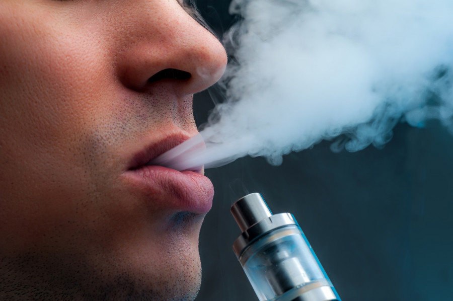 Man Vaping E-cigarette