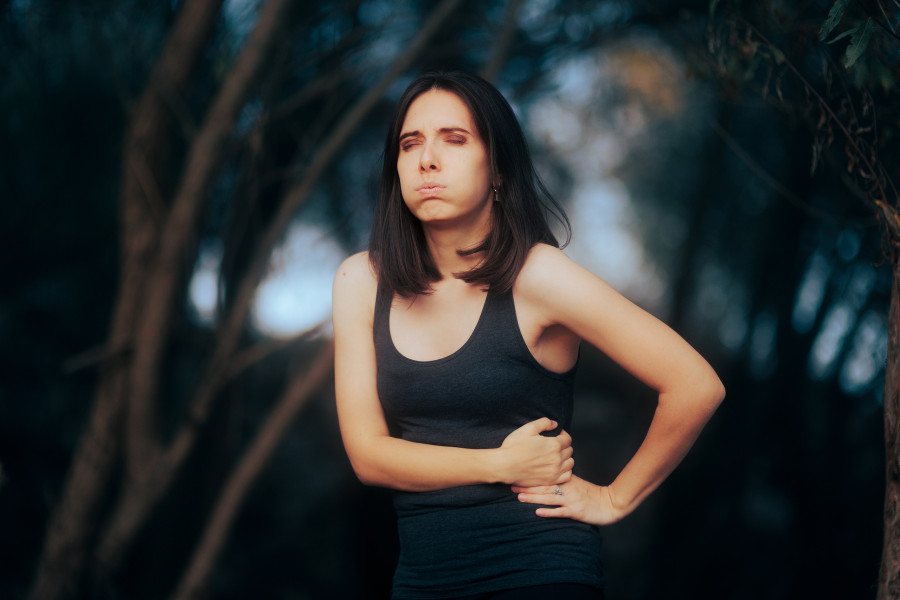Woman Suffering Painful Symptoms In The Left Abdominal Side