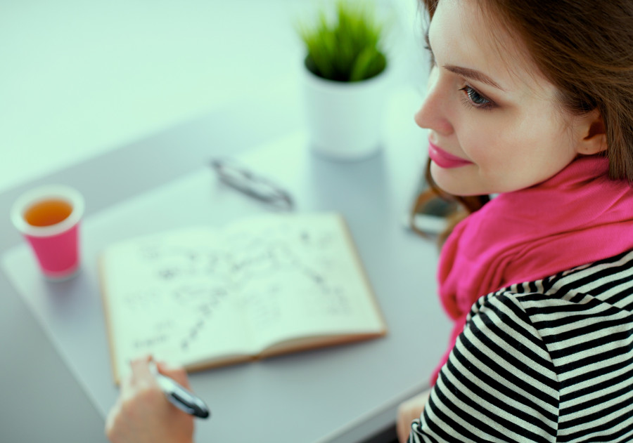 woman writes to diary