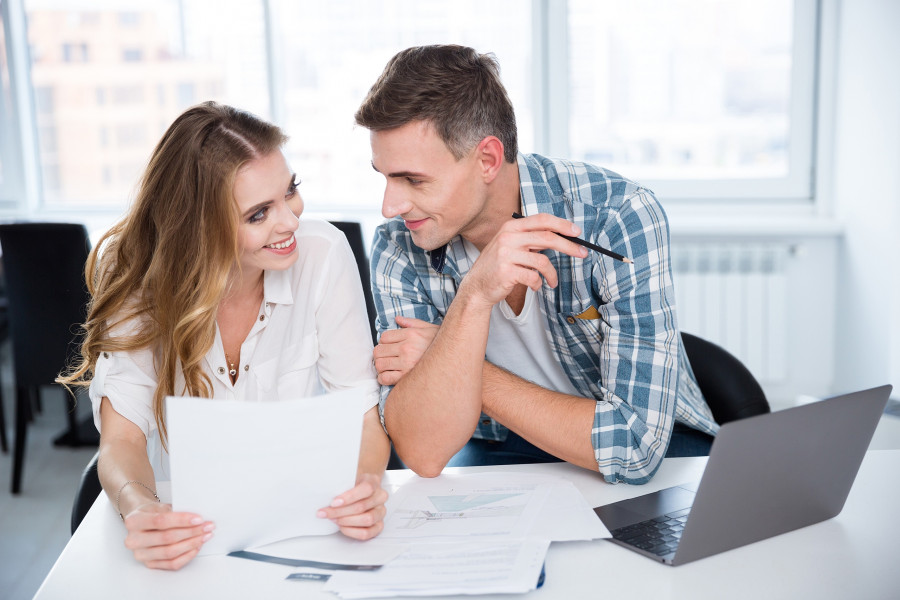 man and woman working and flirting on business meeting