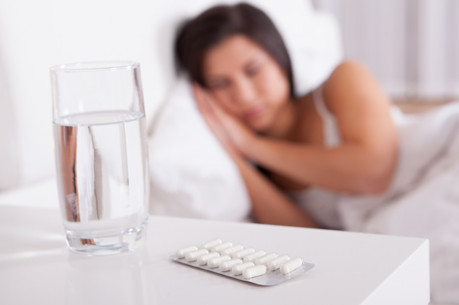 Sick Woman Resting In Bed