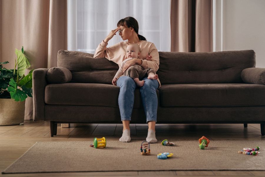 Tired Single Mother Suffering From Postpartum Depression
