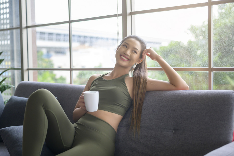 Fitness Woman Having A Cup Of Coffee