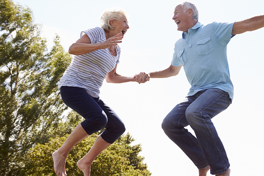 Senior Couple Jumping