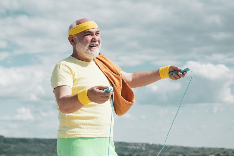 Senior Man Jumping With Skipping Rope