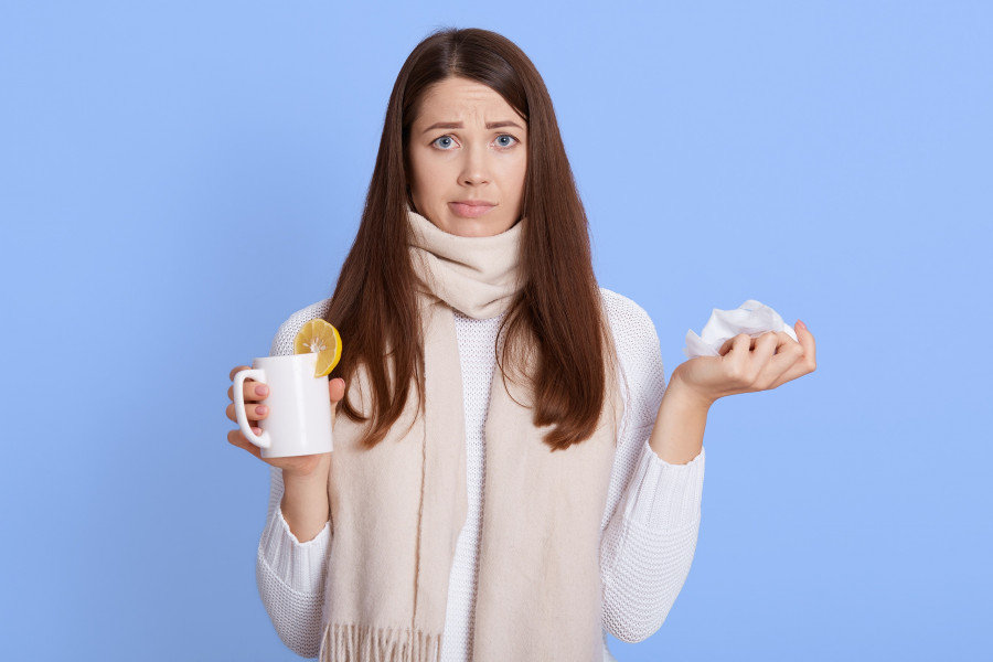 Sick Woman Flu Cold Holding Cup With Tea And Lemon