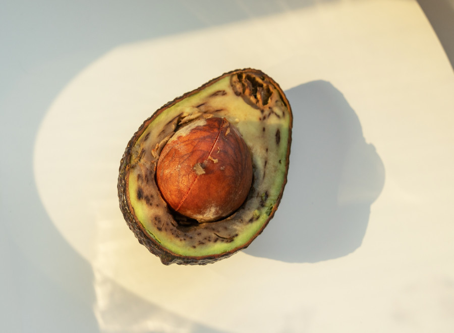 Rotten Avocado Cut In Half. Overripe Bad Fruit