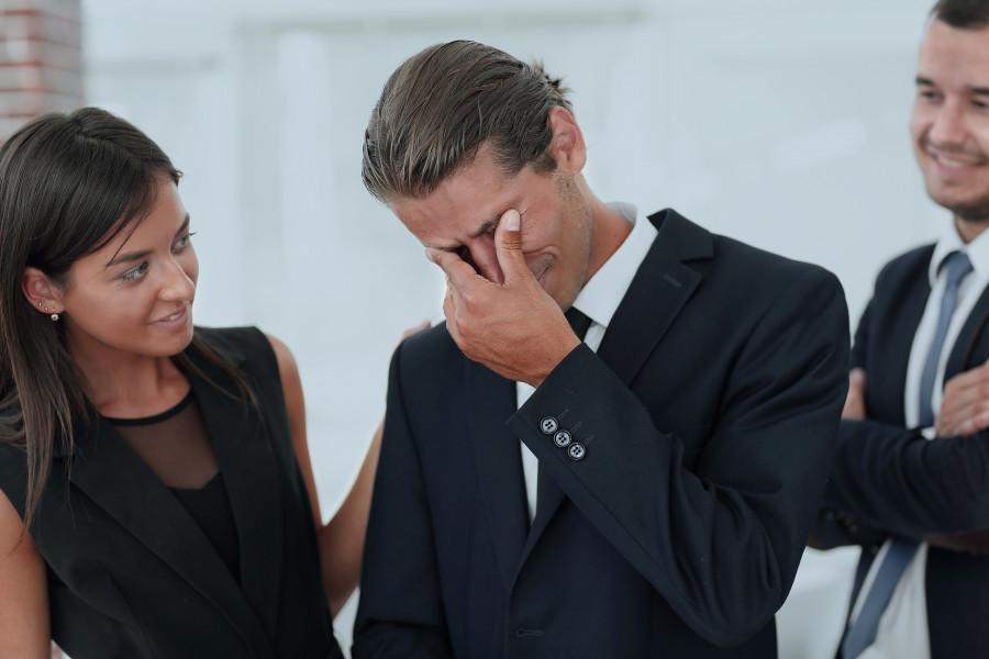 young businessman with tears of joy