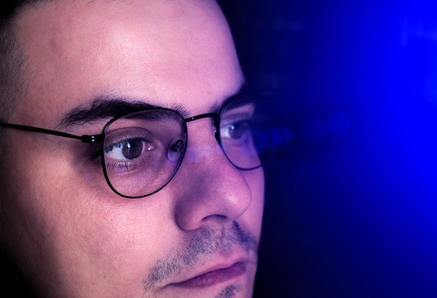 Reflection At The Glasses From Laptop