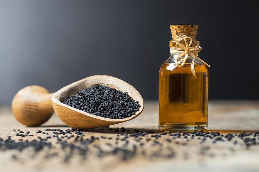 Glass Bottle Of Black Cumin Seeds Essential Oil , Nigella Sativa