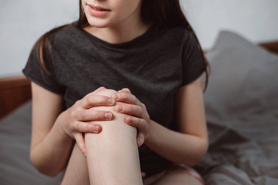 Woman With Knee Pain