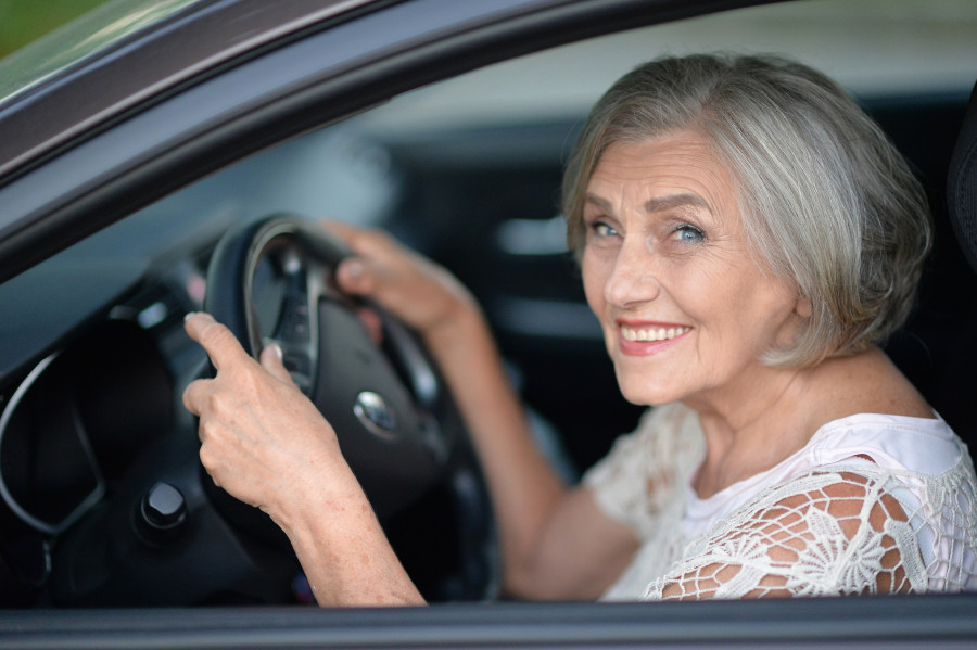 Senior Woman Driving Car