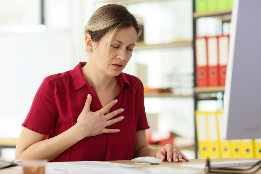 Woman Feels Hard To Breathe Putting Hand On Chest