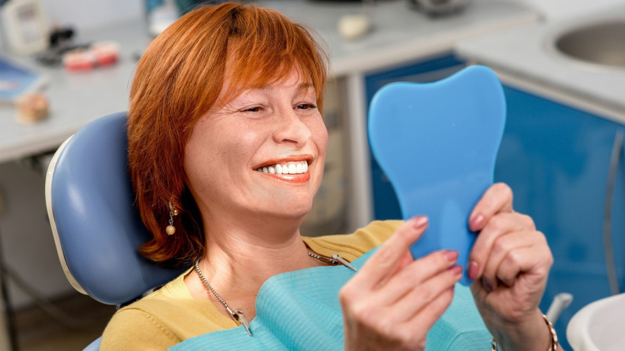 Senior woman in the dental office