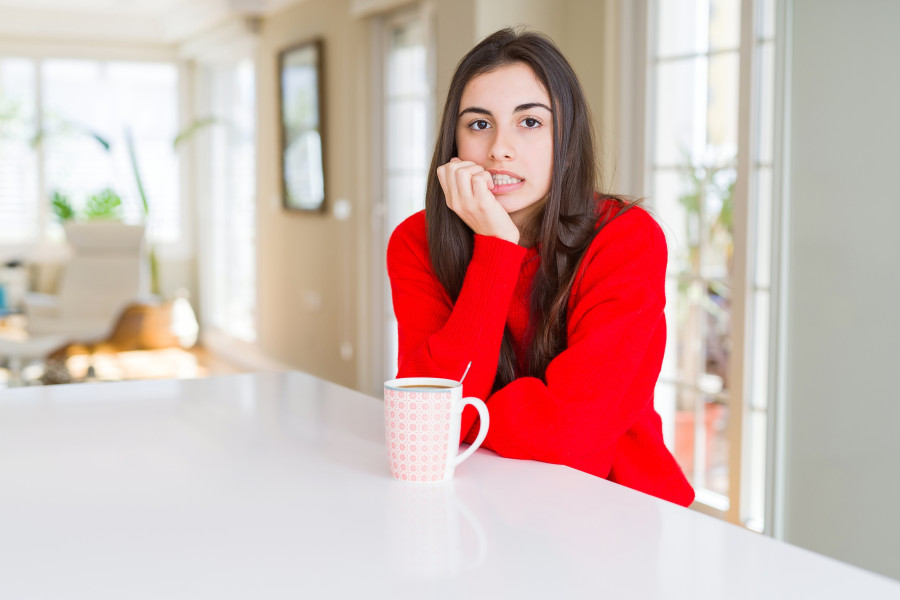 woman drinking a cup of coffee