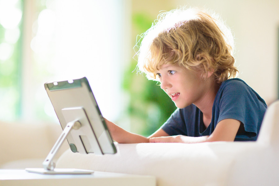 Child With Tablet Computer