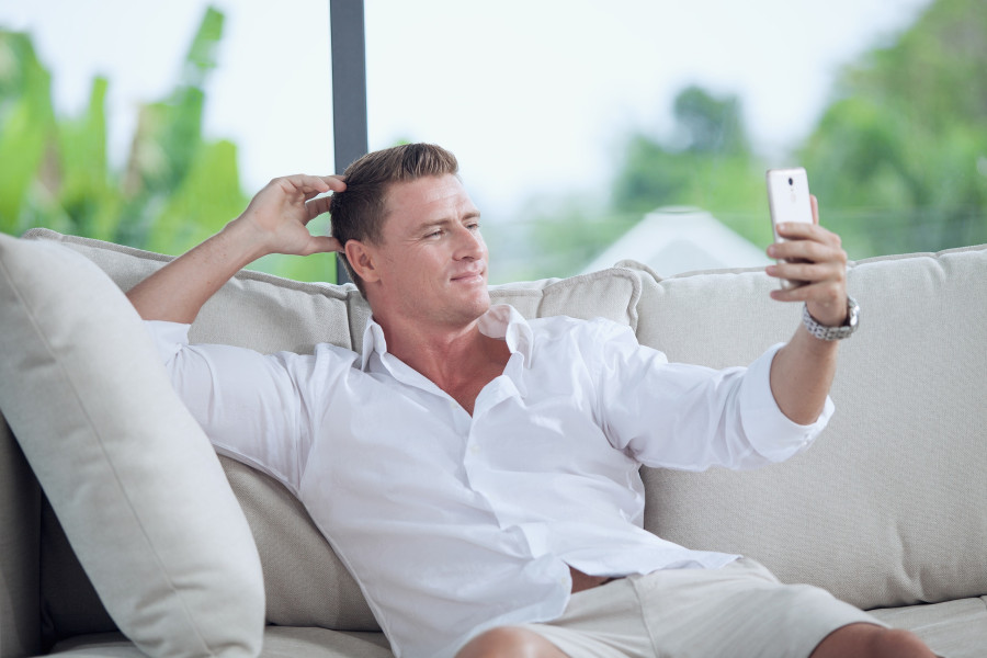 man making self photo with his mobile phone
