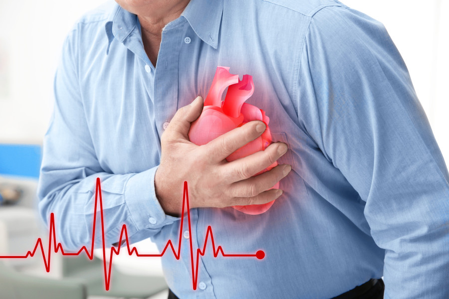 man suffering from chest pain heart attack