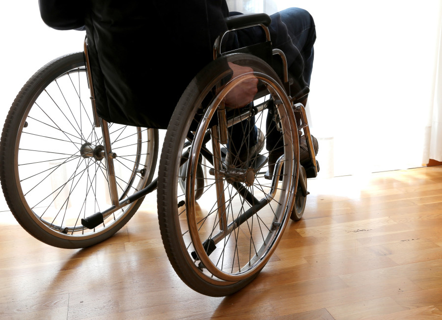person with disability in a wheelchair